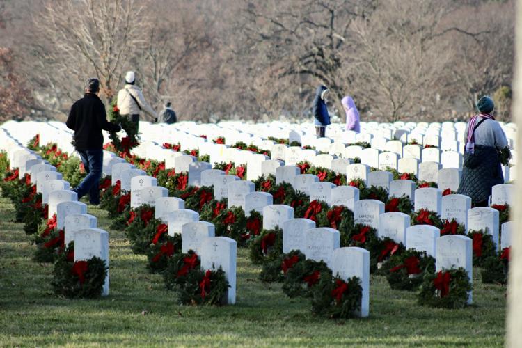 IN PHOTOS Wreaths Across America at Arlington National Cemetery IN PHOTOS Wreaths Across America at Arlington National Cemetery