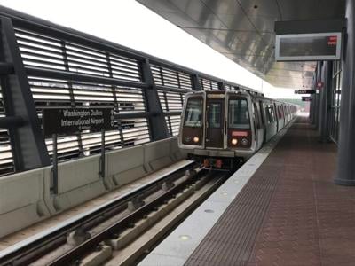 Commuters risk life to board local train through half-open doors