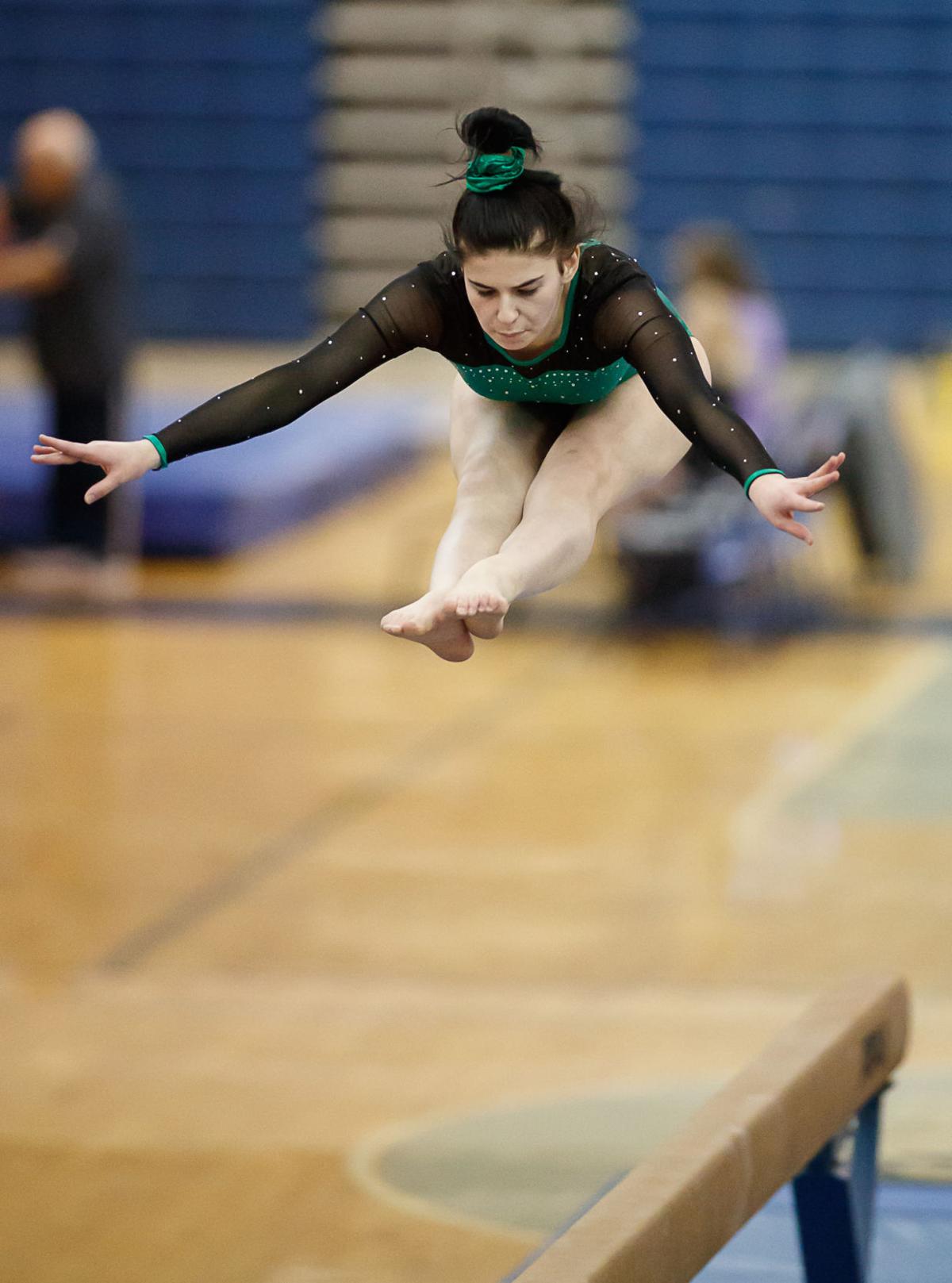 PHOTOS Arlington highschoolers face off in gymnastics tournament