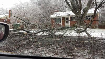 Storm closes roads, knocks out power to tens of thousands | Local ...