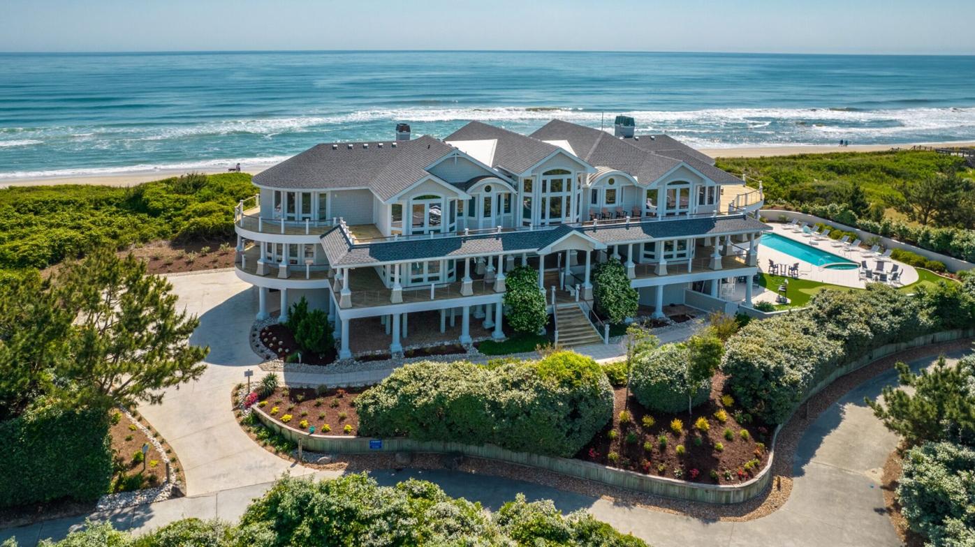 big mansions with pools on the beach
