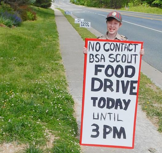 Staffordarea scouts serve ??? safely ??? with a nocontact food drive