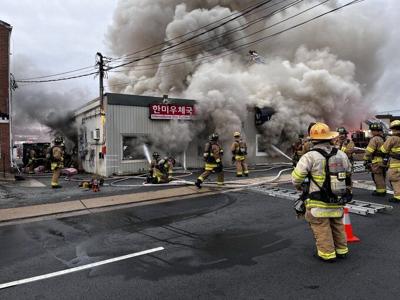 Crews battle two-alarm shopping center fire in Annandale | Headlines ...