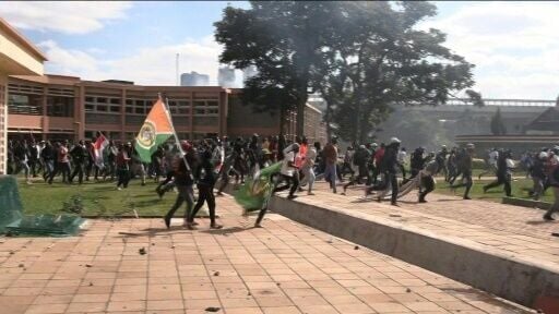 Protesters breach Kenya parliament, destroy properties and burn down section of the parliament (videos)