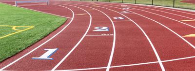 200 meter start line on a red track