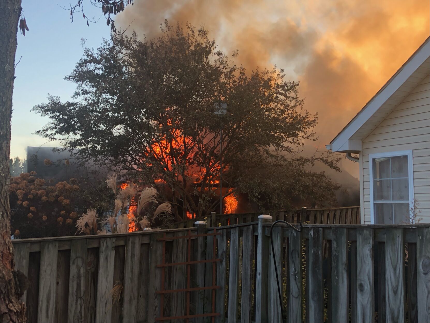 Culpeper firefighters working garage fire on Sally Lou Lane