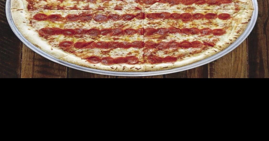 Known for 28inch pies, Benny’s Pizza opens in Old Town Manassas