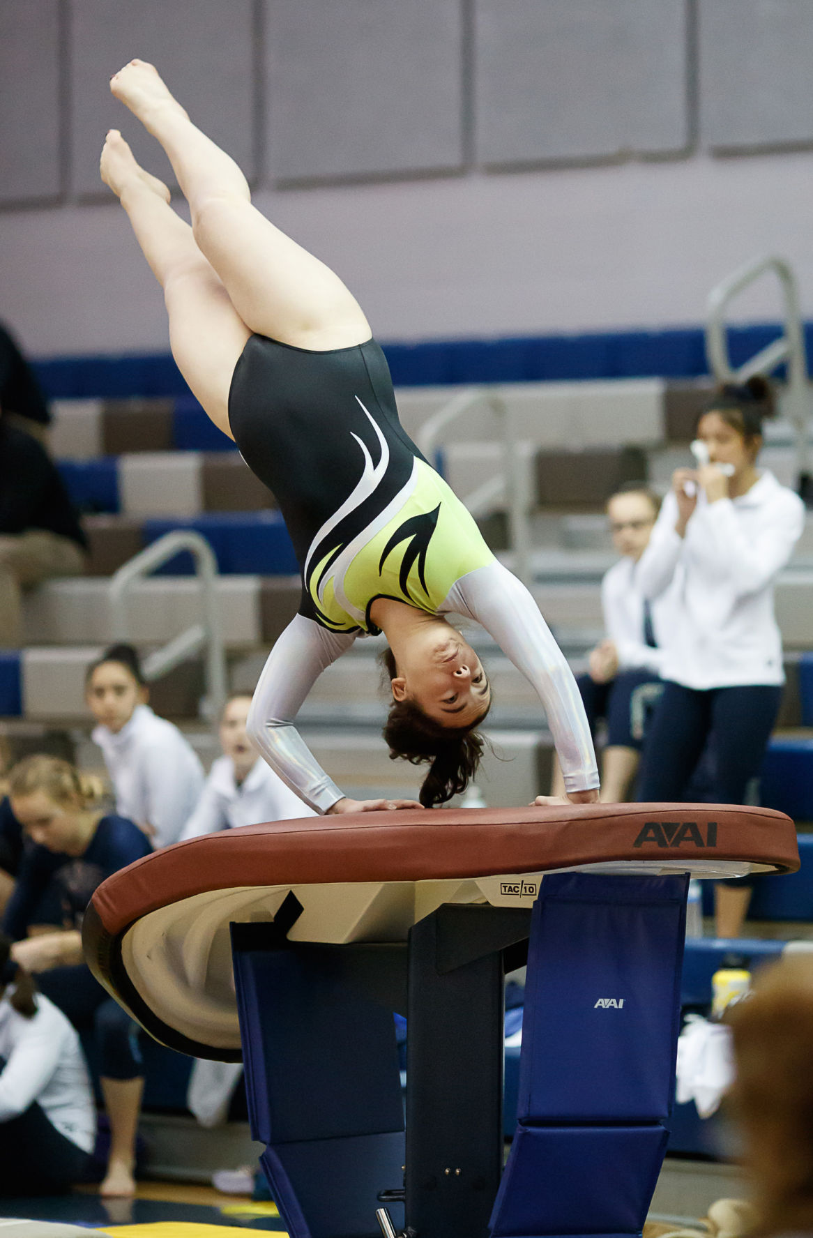 PHOTOS Arlington highschoolers face off in gymnastics tournament