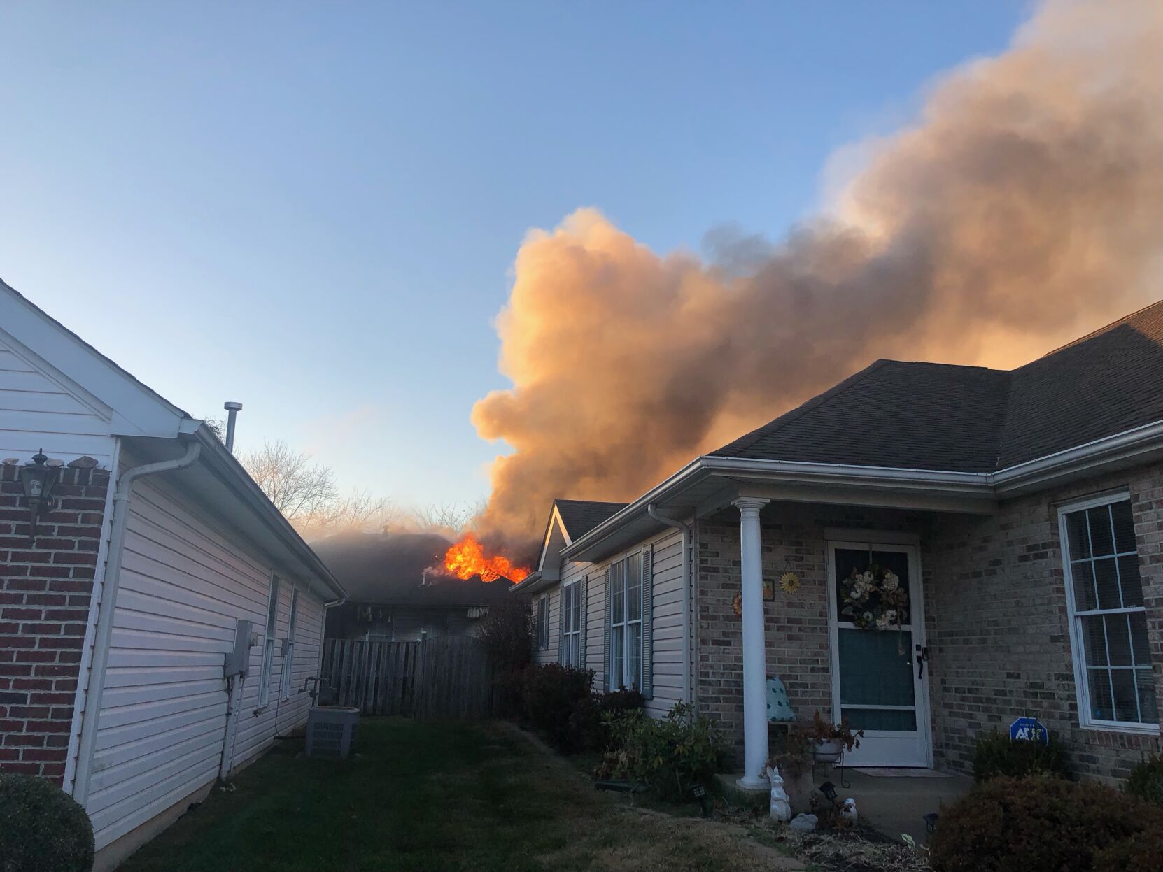 Culpeper firefighters working garage fire on Sally Lou Lane