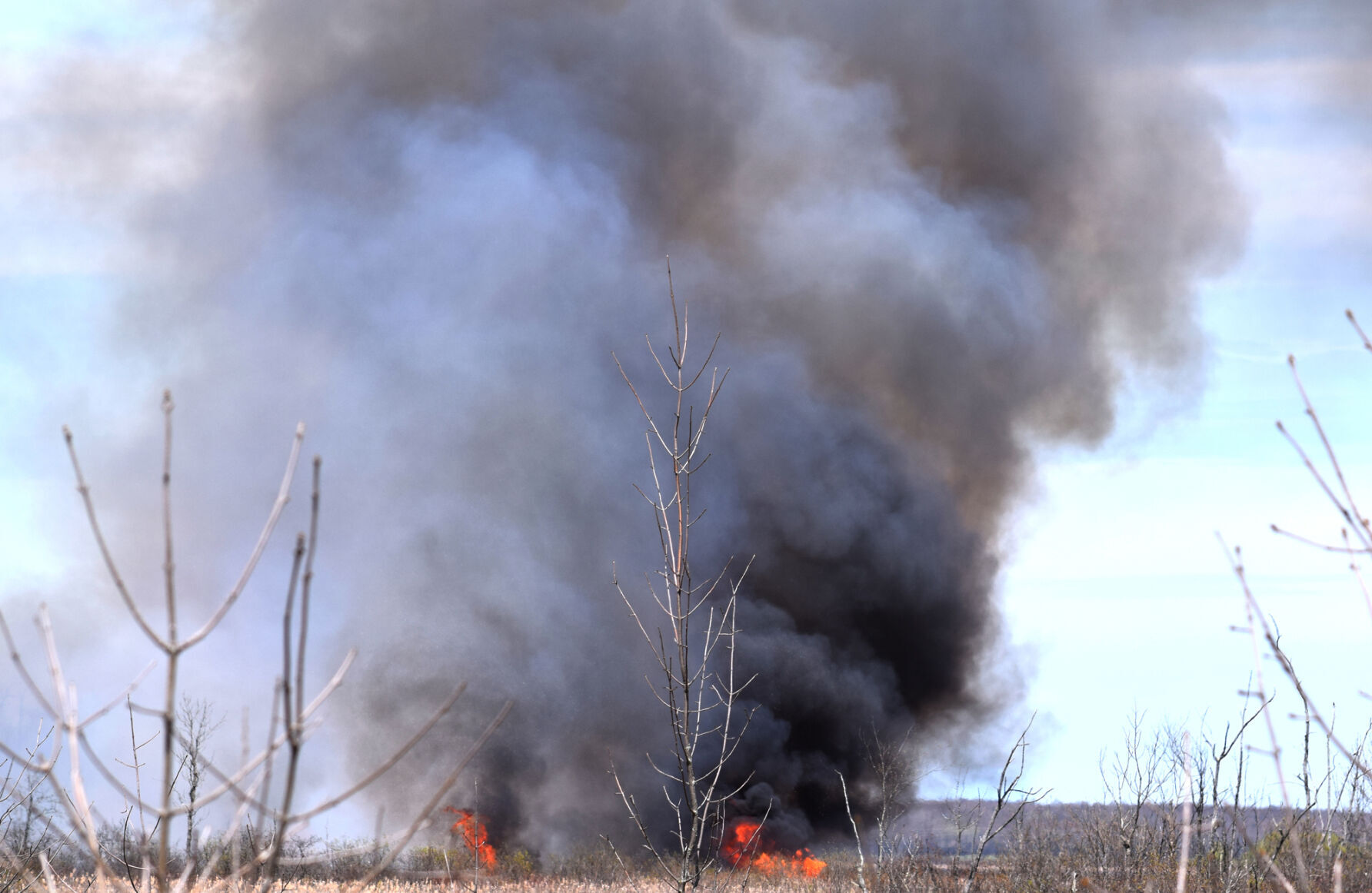 Multiple departments reporting to out of control grass fire