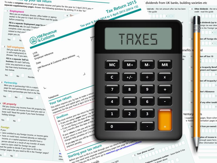 Sa100 Tax Return Form With Calculator And Pencil Lying On Table