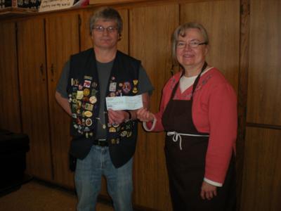 Ogilvie Lions contribution benefits food shelf program isanti