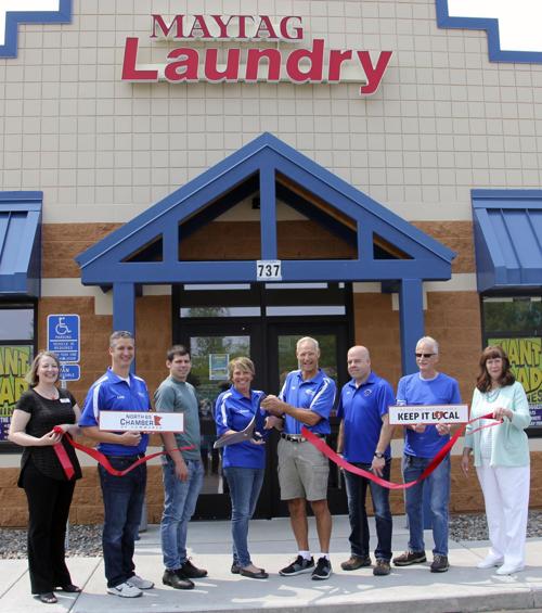 New Cambridge laundromat cuts the ribbon