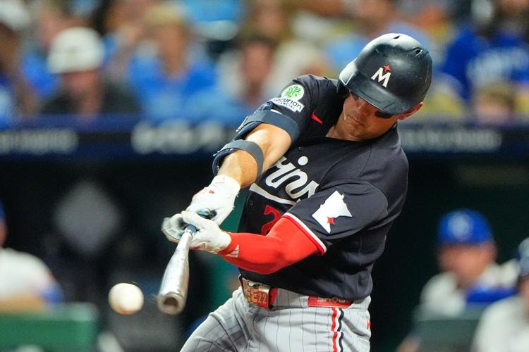 Brooks Lee stepping up to the plate with bases loaded against Kansas City Royals