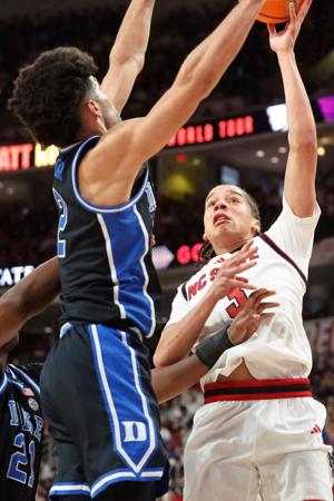 No. 1 Duke clinches outright ACC title with 93-64 win at NC State