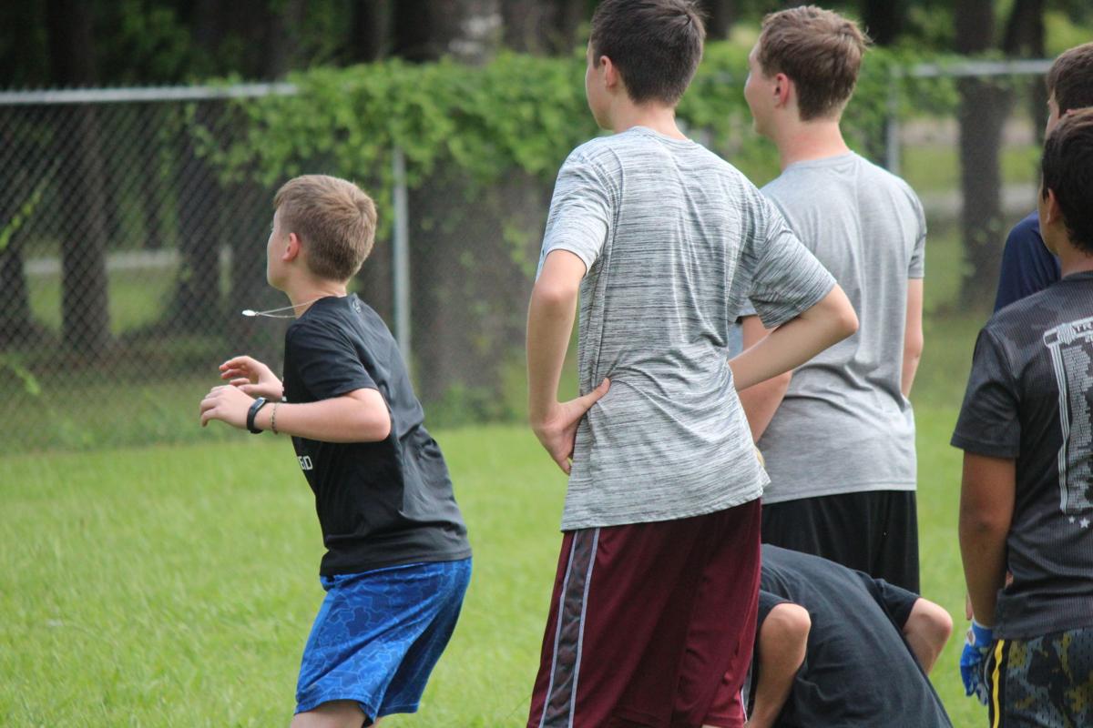 Campers hone skills, catch glimpse into AOA football program | Alpha