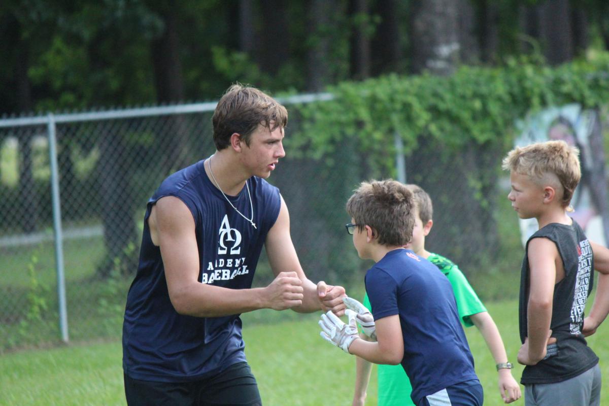 Campers hone skills, catch glimpse into AOA football program | Alpha