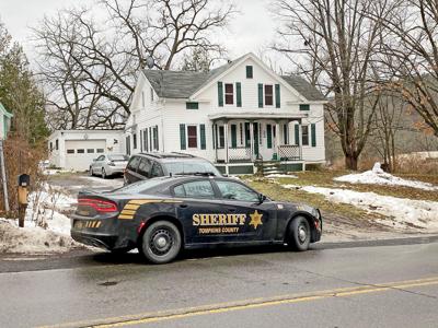 A sheriff's car sits outside 22 Shaffer Rd. in Newfield the morning of Dec. 10. Members of the Tompkins County Sheriff's Department responded to the home Dec. 7 to find DeJour Xavier Gandy, 29, dead of a gunshot wound.
