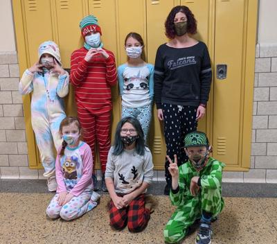 Fourth grade students dress up for Polar Express Day at South Seneca Elementary School. From left to right: (back row) Chloe Cooper, Bailey Lavarnway, Nadja Paparone, and fourth grade teacher Alex Ackerman. (Front row) Leigha McGuire, Jasmine Mandigo, a...