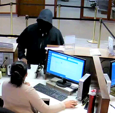Bank robbery reported in Lansing, video released | News ...