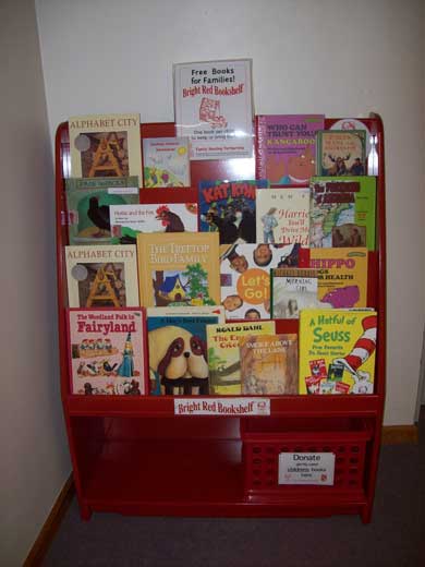 Bright Red Bookshelf Helps Groton Children Learn To Love Reading