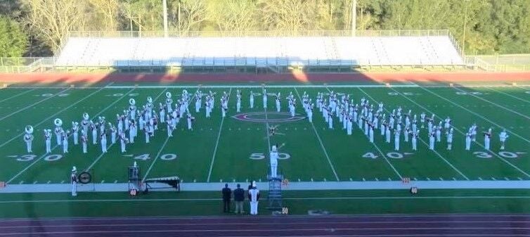 monroe township high school marching band competition
