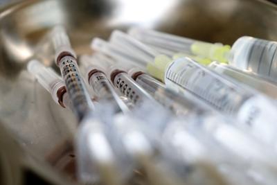 syringe covid vaccine