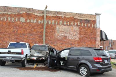 Crash in public parking lot damages property, no injuries reported ...