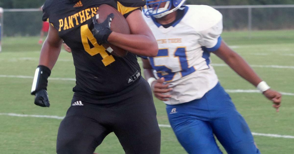 JCSentinel.com - Woodville uses its new smash-mouth offensive approach to notch a jamboree win image