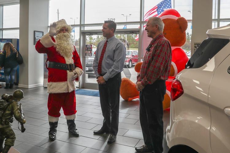Photos Sanders Ford draws name of car winner News