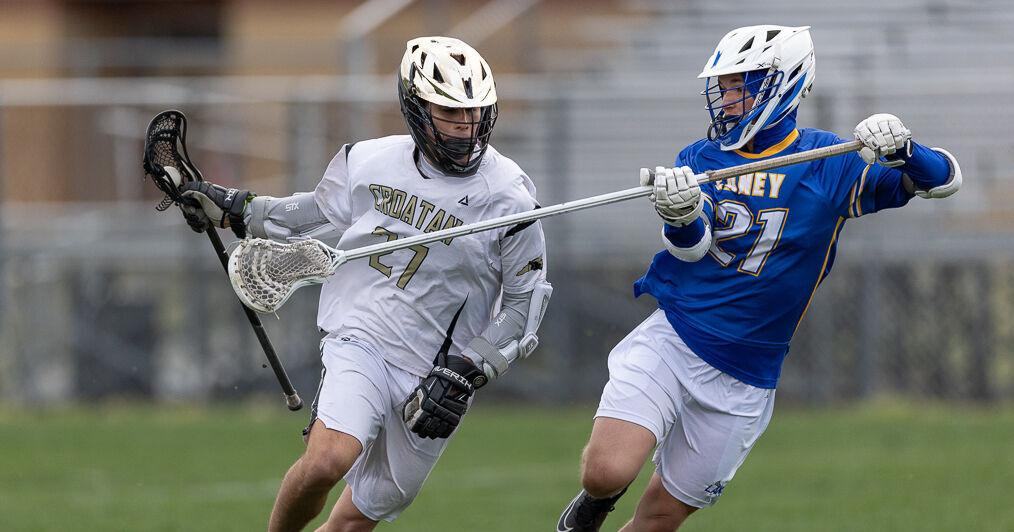 PHOTOS: Croatan boys, girls lacrosse down Laney