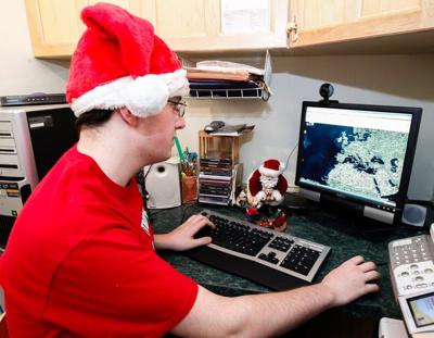 Patric With Computer Local student to track St. Nick’s path for fifth year | News | jdnews.com