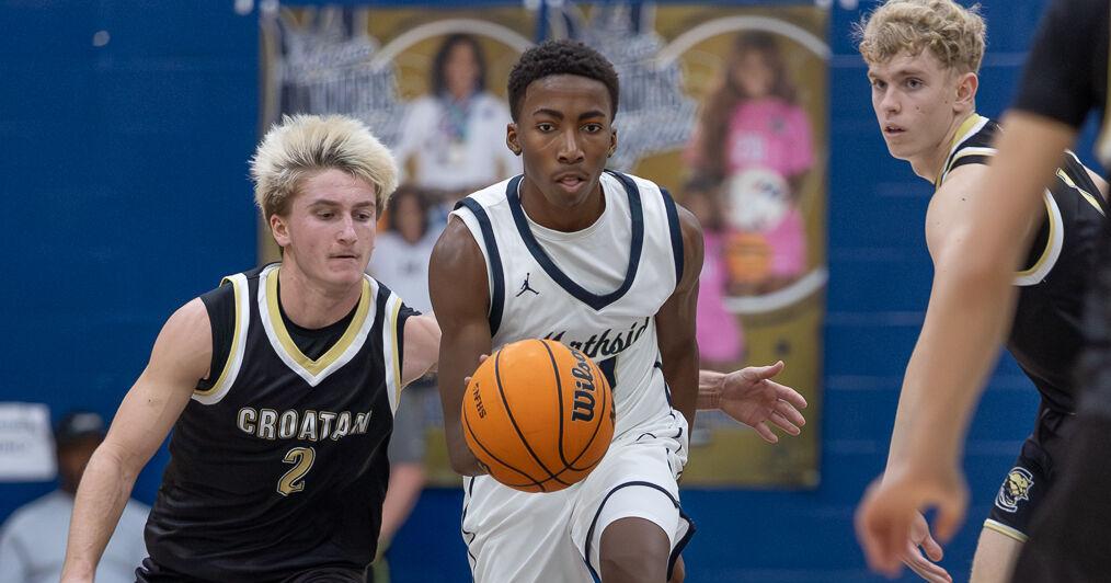 PHOTOS: Croatan, Northside split in basketball