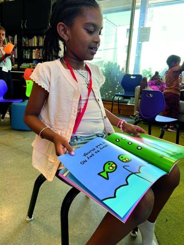 Living the story: Dr. Michelle Martin brings books to life for young readers