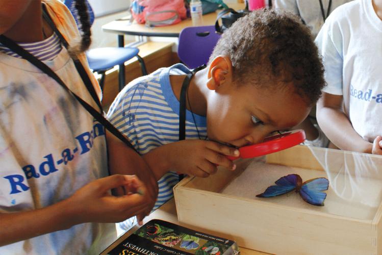 Living the story: Dr. Michelle Martin brings books to life for young readers
