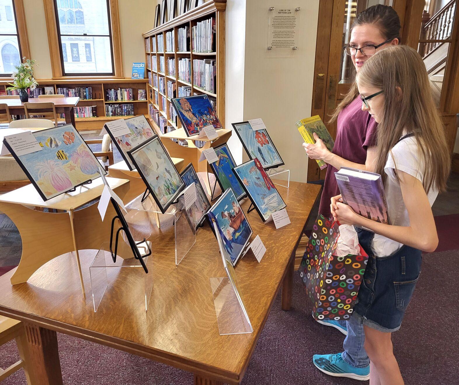Youths work with Mattoon library art contest's ocean theme