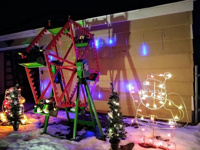 A 7foot Ferris wheel and hundreds of lights. How this Mattoon yard is