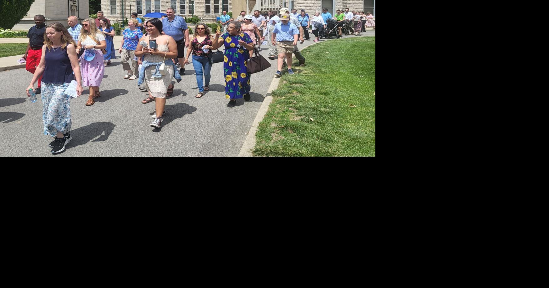 Charleston procession walks 1.8 miles from St. Charles to Newman Center
