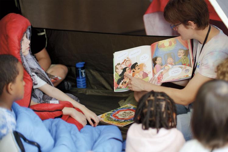 Living the story: Dr. Michelle Martin brings books to life for young readers