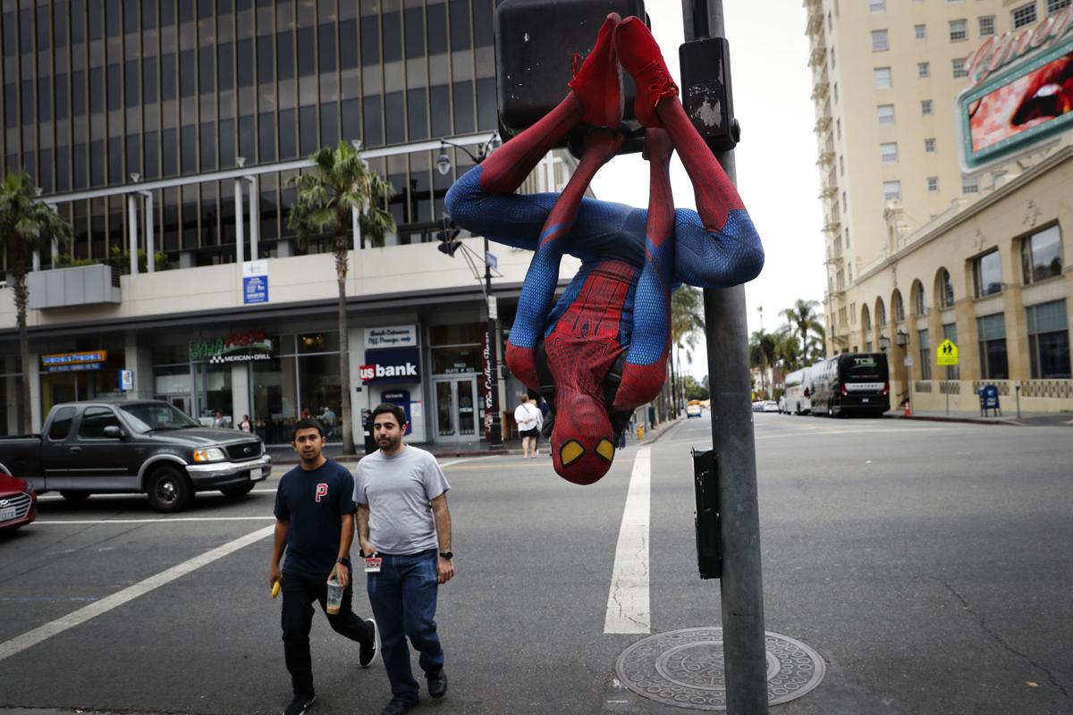 APTOPIX Street Superheroes-Photo Essay