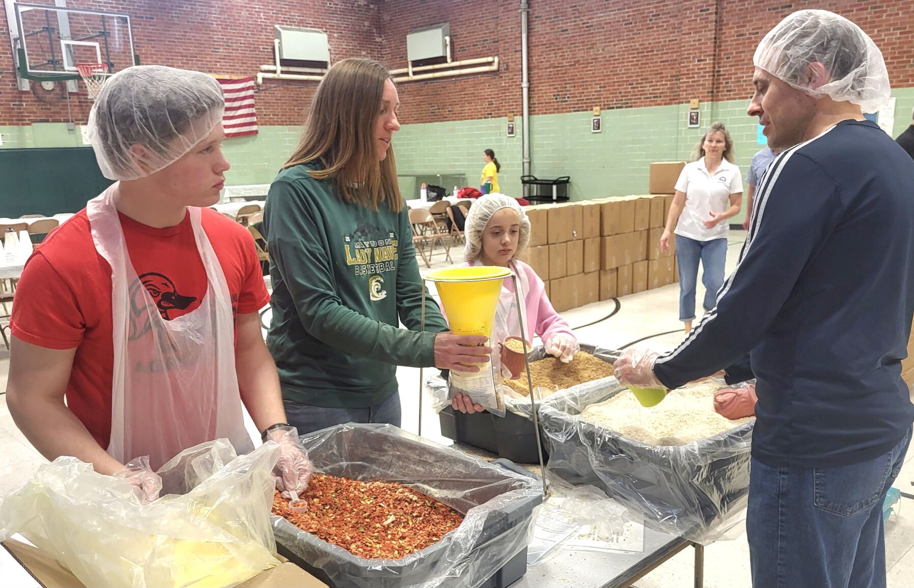 Mattoon Catholic church packs food for Venezuela parish