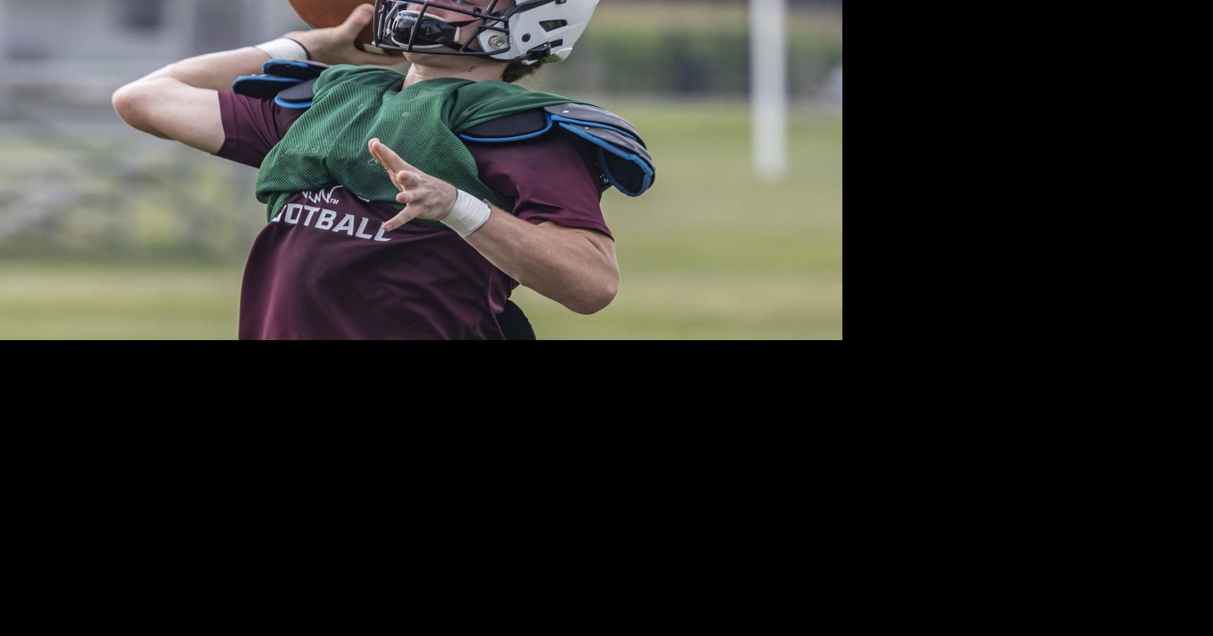 Mattoon senior quarterback Jackson Spurgeon attacking the season with a(00)