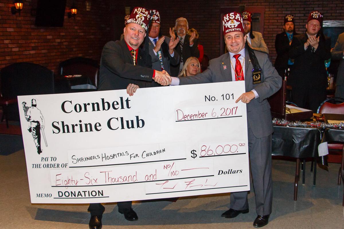 Corn Belt Shrine Club donates to Shriners