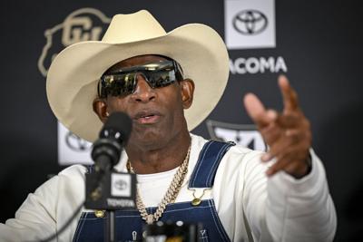 Head coach Deion Sanders of the University of Colorado speaks about his journey beating bladder cancer during a press conference in the Touchdown Club at Folsom Field in Boulder, Colorado, on Monday, July 28, 2025.
