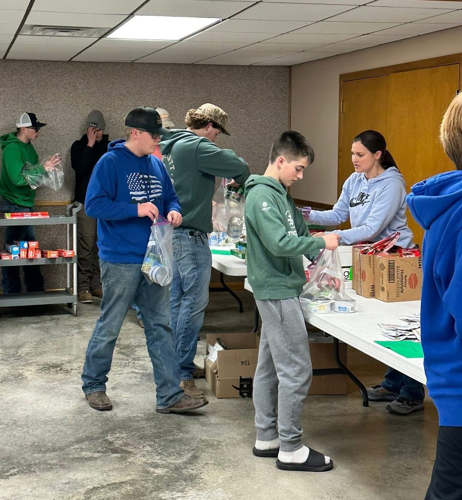 Barnstormers preparing the meal kits.png