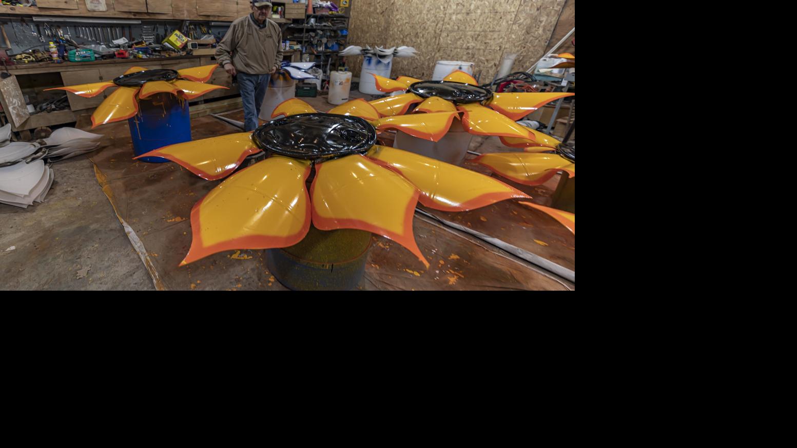 Watch now Meet the creator of the large plastic flowers livening up