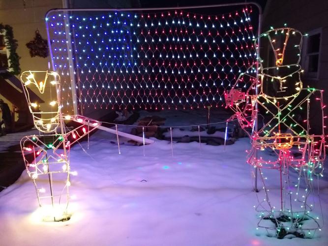 A 7foot Ferris wheel and hundreds of lights. How this Mattoon yard is