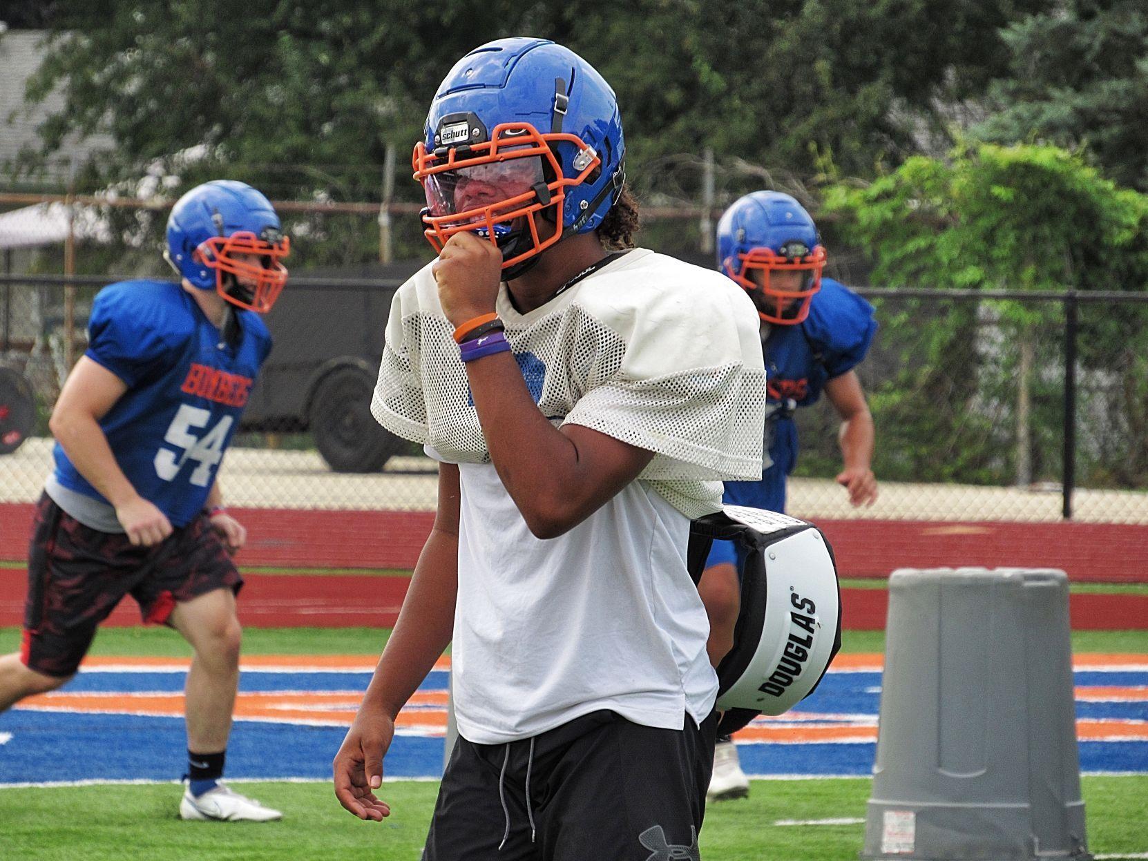 New coach Conner Haltom has a long history with ArgentaOreana football