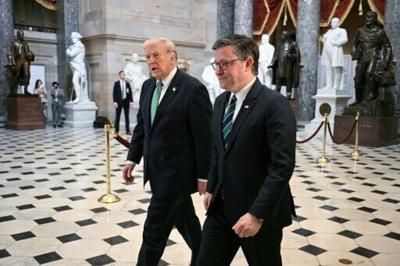 Donald Trump (L) is guided by House Speaker Mike Johnson through Congress, which is narrowly controlled by the US president's Republican Party