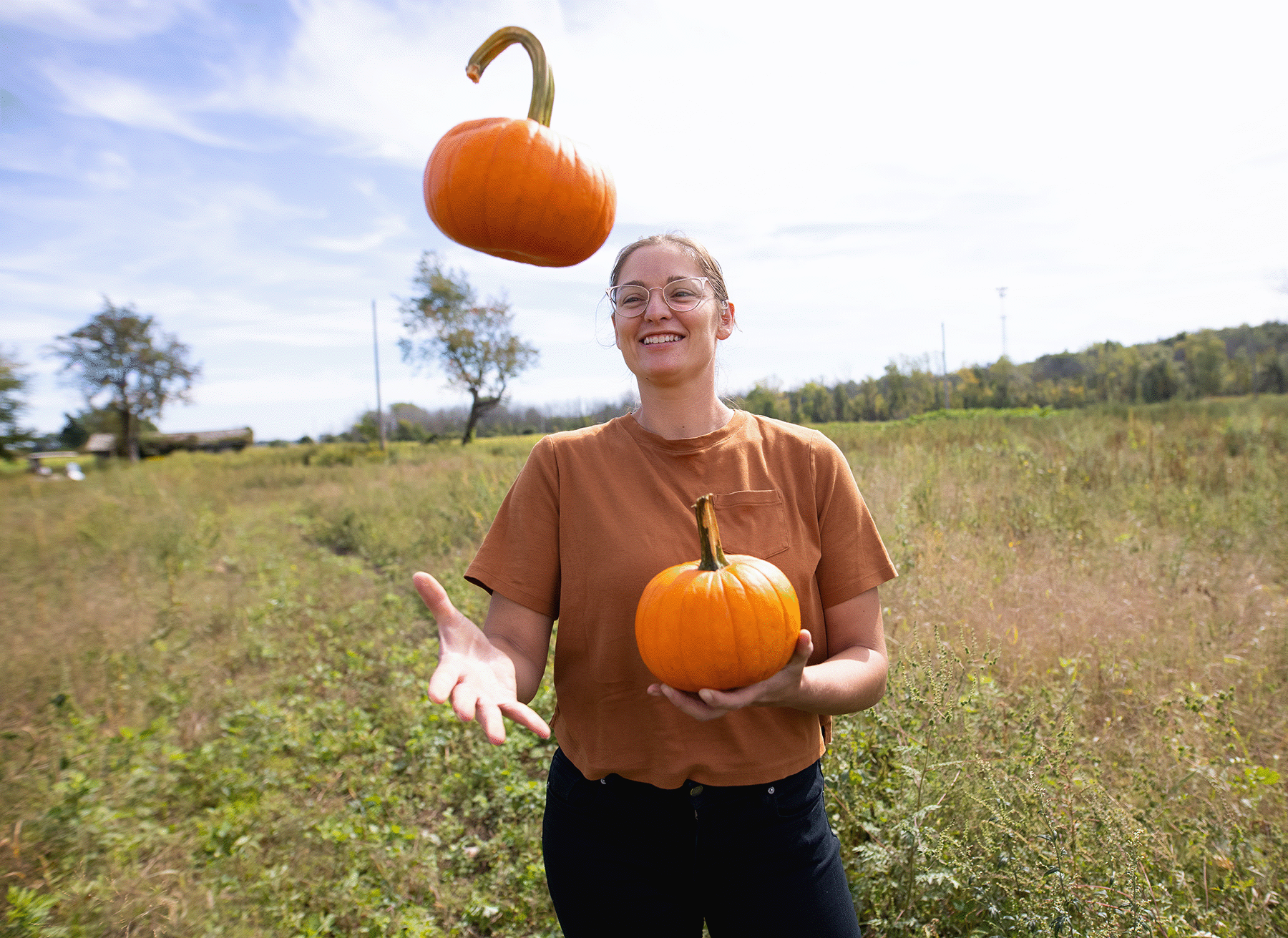 Ashley Pass, Assistant Manager, juggling pumpkins